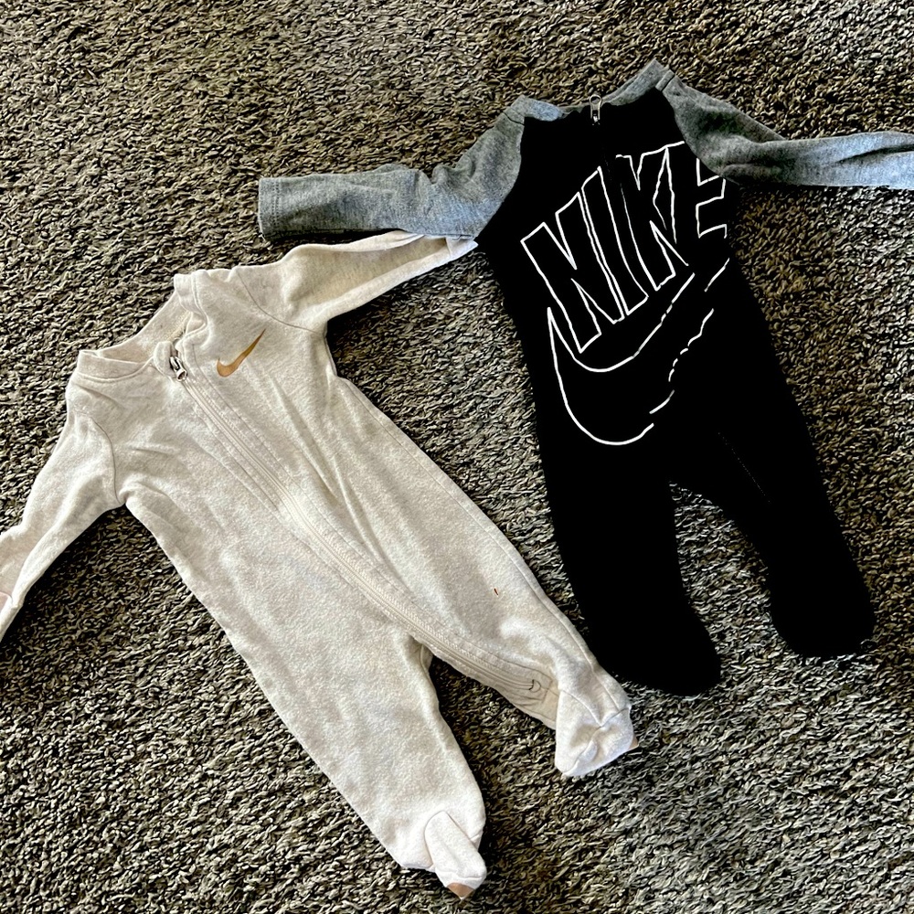 2 Nike newborn footie pajamas